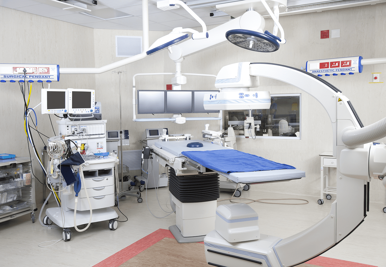 Modern hospital operating room with medical equipment.